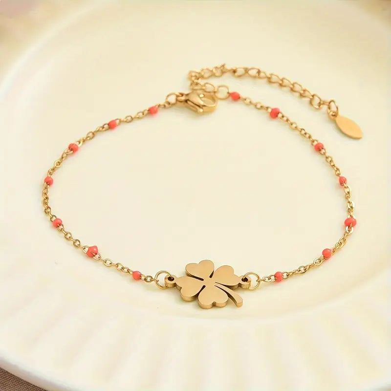 Stainless Steel Armband met Klavertje Vier en Oranje Accenten